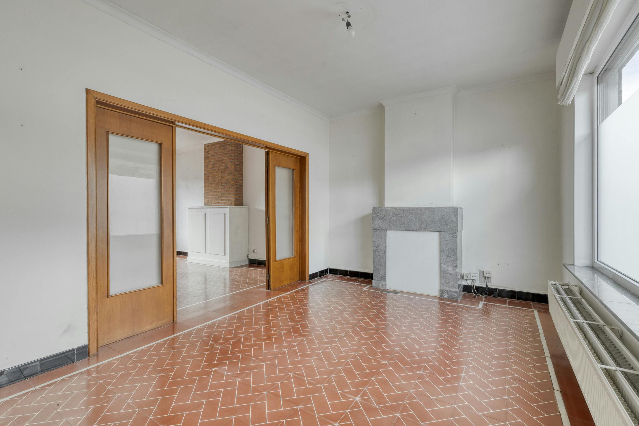 Ruime woning met tuin & potentieel in hartje Landegem foto 6