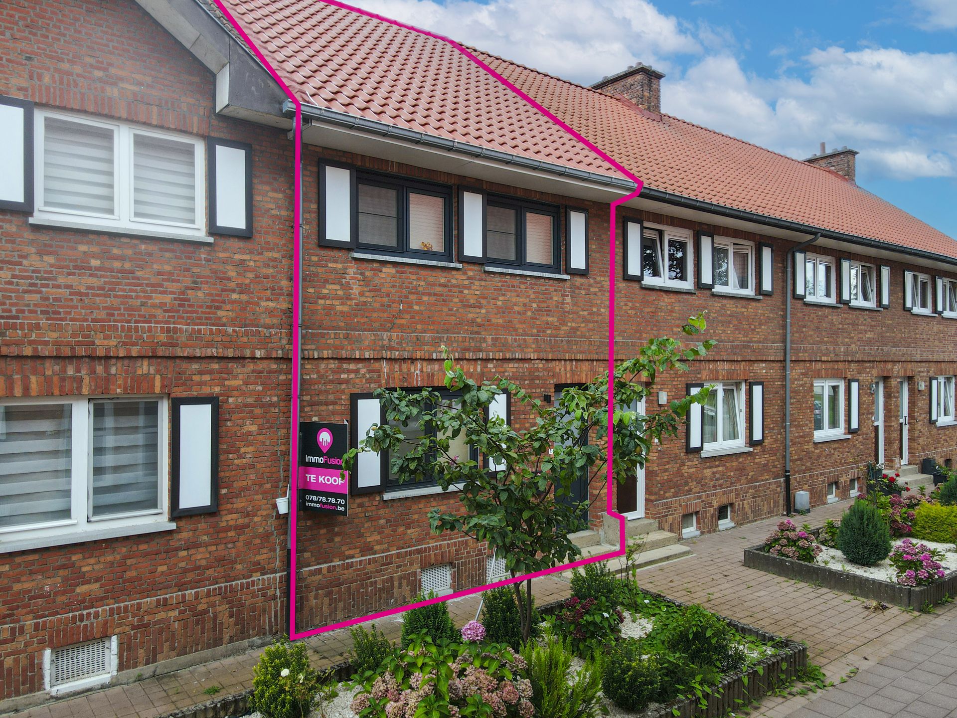 Aangename rijwoning met 3 slaapkamers in leuke woonomgeving! foto 2