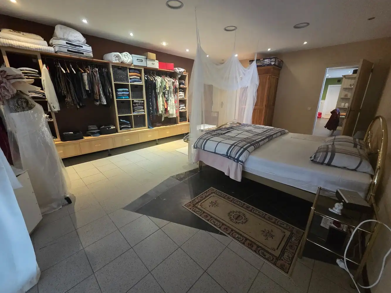 Woonhuis met aangebouwd werkatelier of polyvalante ruimte en garage aanbouwen foto 10