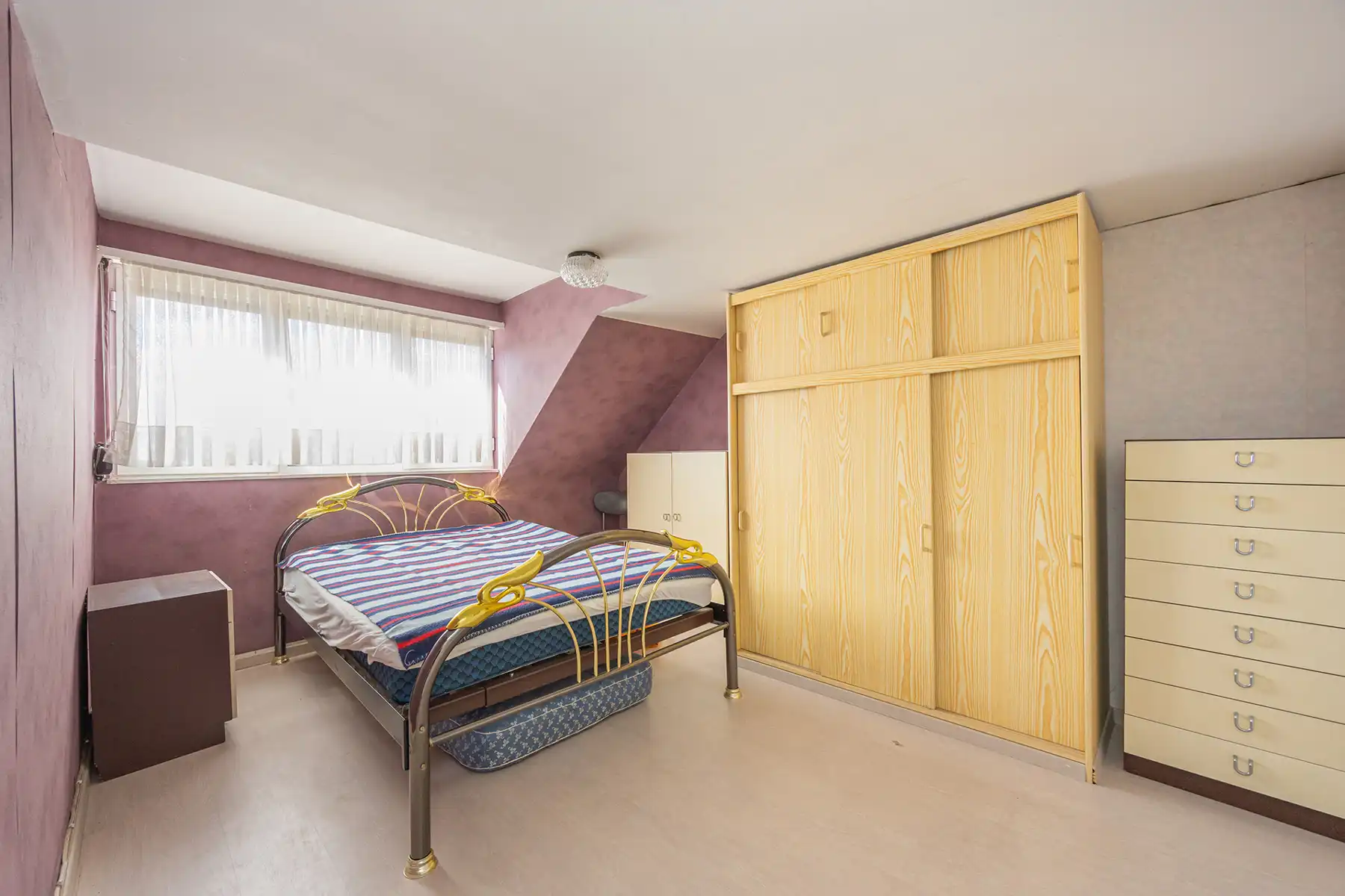 CENTRAAL GELEGEN WONING MET ZONNIGE TUIN EN STERK POTENTIEEL foto 14
