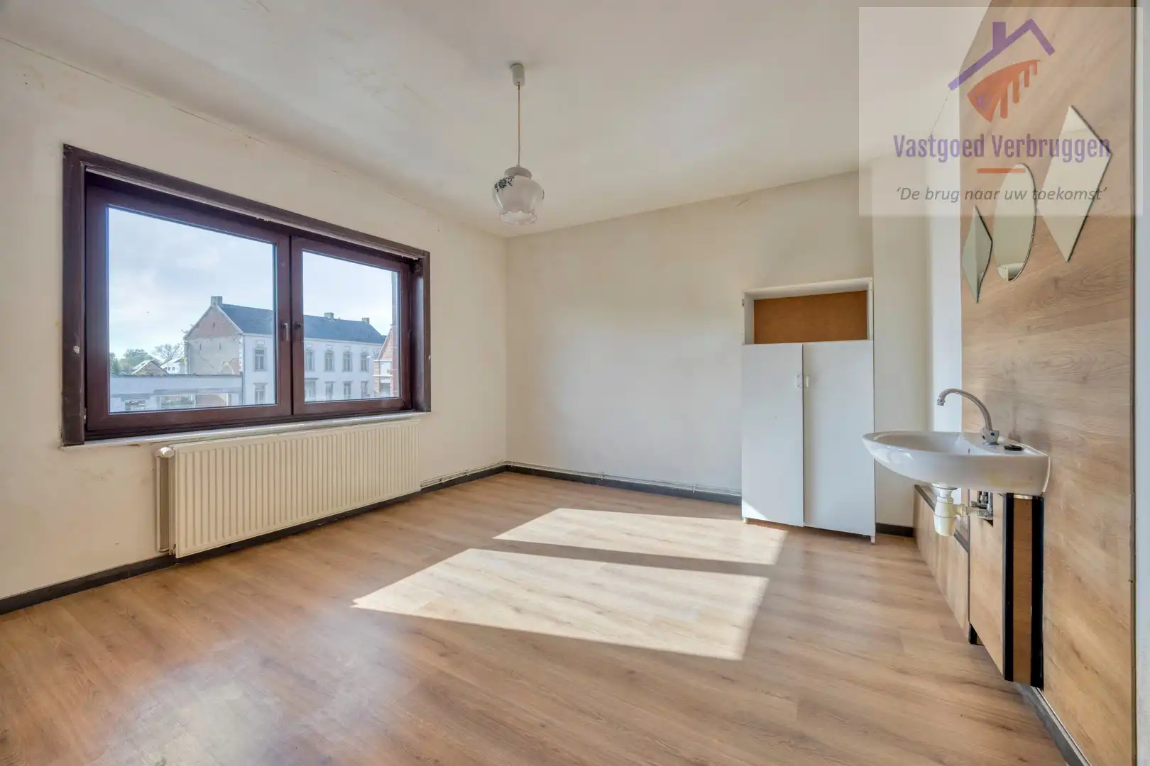Ruime woning vergund als kamerwoning (3 kamers) met winkelruimte foto 10
