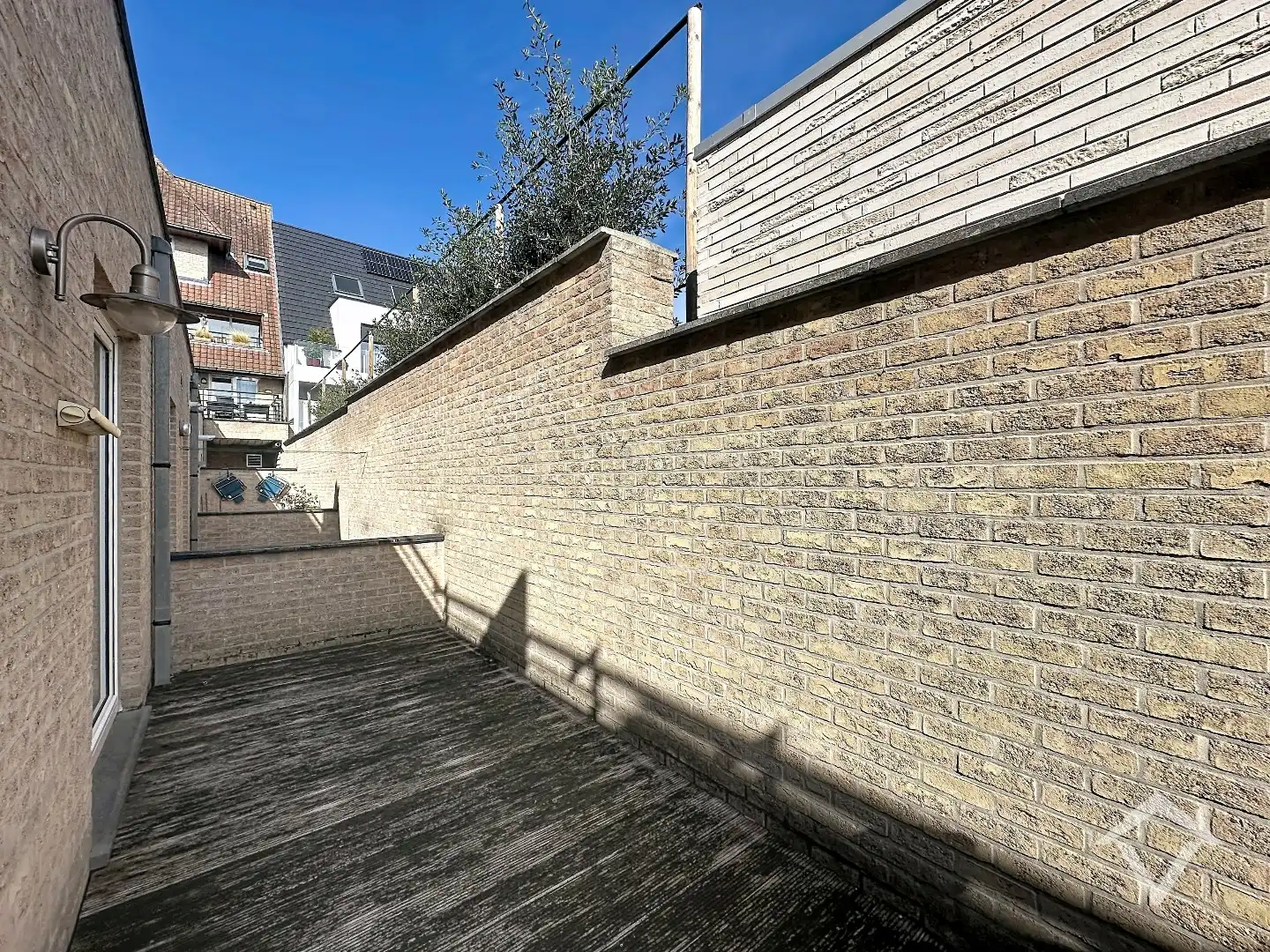 Instapklaar gelijkvloers appartement met twee slaapkamers, terras en ondergrondse parkeerplaats.  foto 19