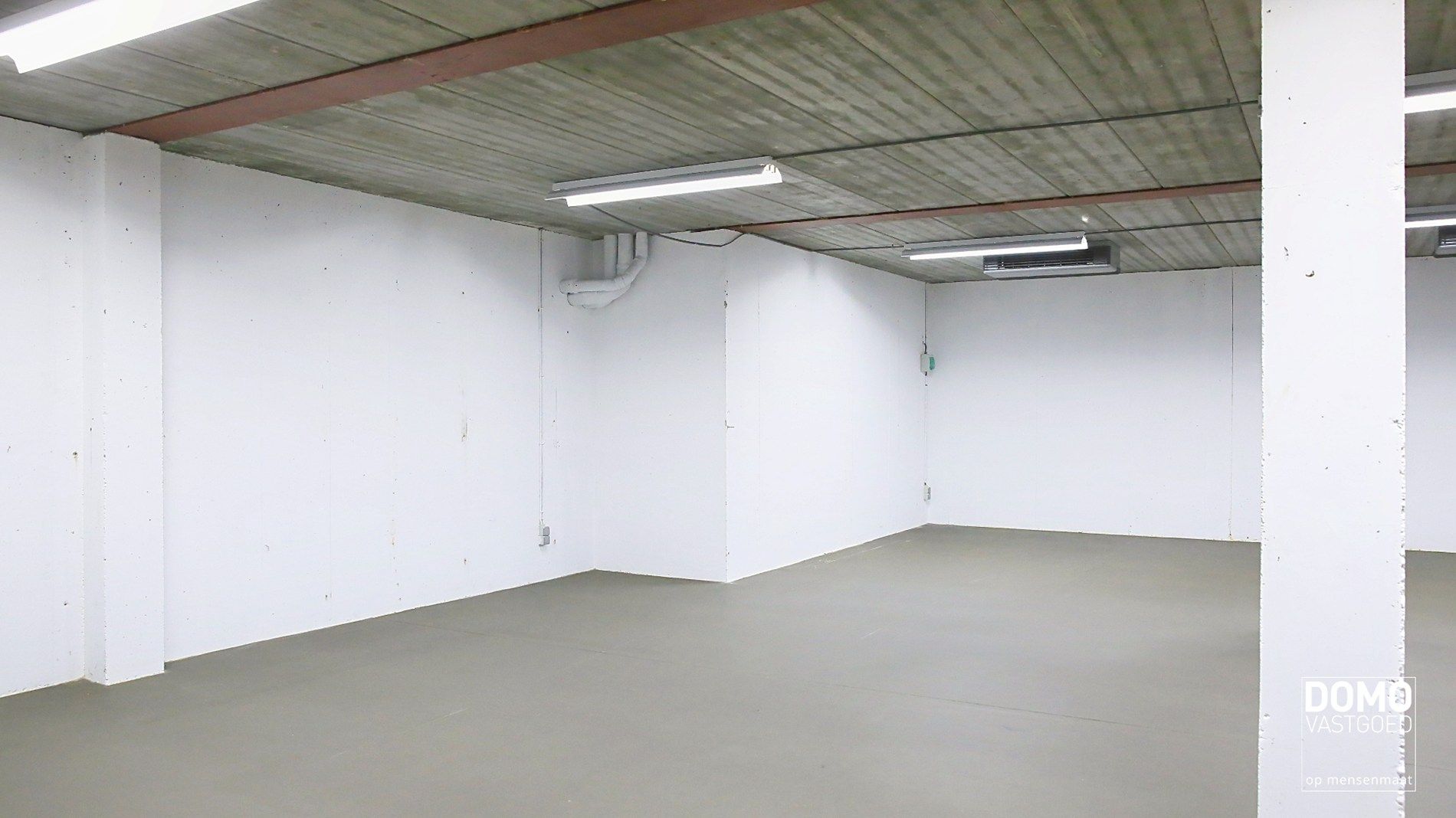 Commerciële ruimte met kelder te huur te Herk-de-Stad foto 8