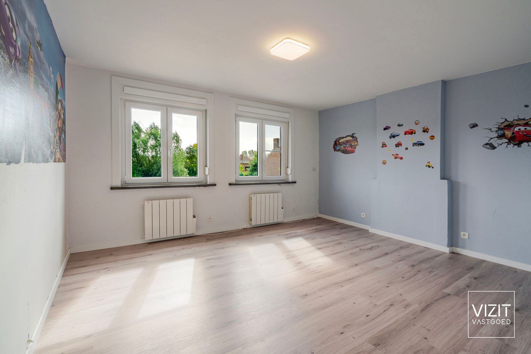 Zeer ruime halfopen woning aangename tuin foto 13