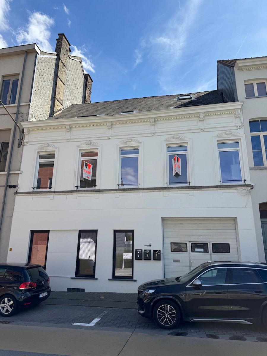 Volledig vernieuwd gelijkvloers appartement in het stadscentrum! foto {{pictureIndex}}