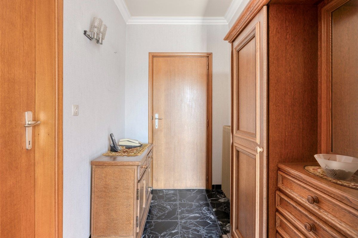 Gelijkvloerswoning met oa 3 slaapkamers in een rustige doodlopende straat. foto 2