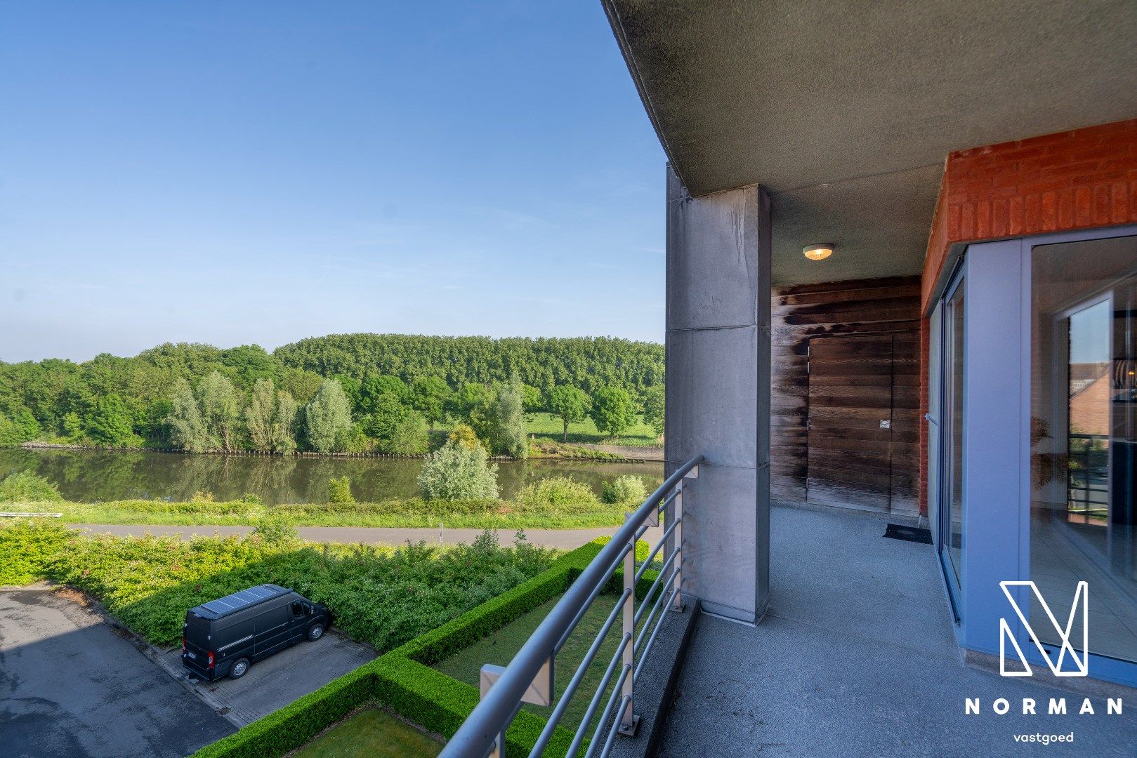 Ruim appartement met 2 slaapkamers, ondergrondse garage en prachtig zicht op de Leie foto 5