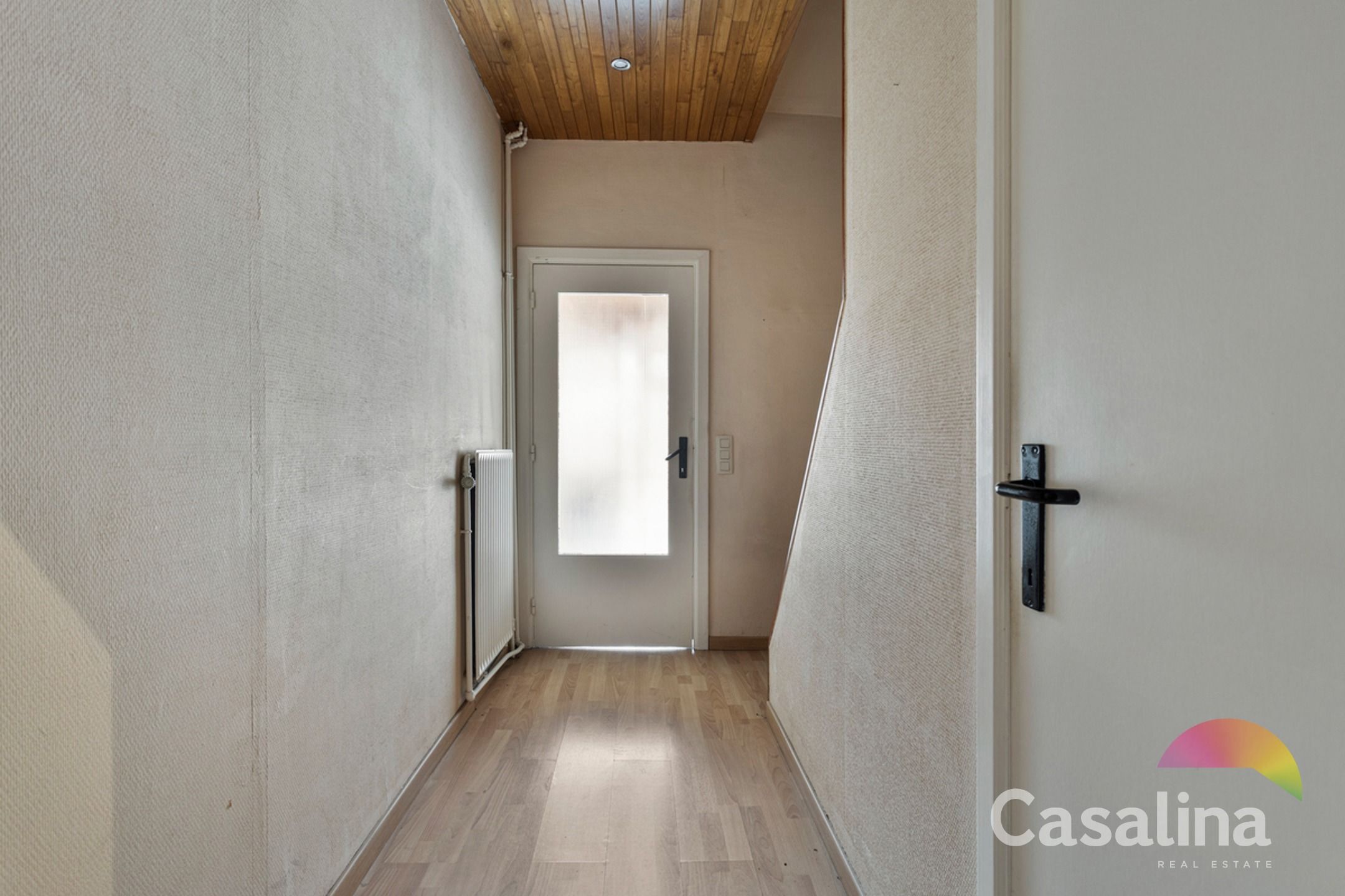 Een ruime te renoveren rijwoning van 207m² met zonnig terras foto 10