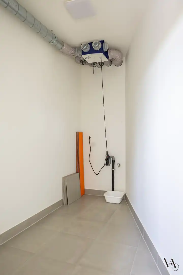 Ruim hoekappartement met uitzonderlijke tuin in groene parkresidentie nabij het centrum van Leuven foto 12