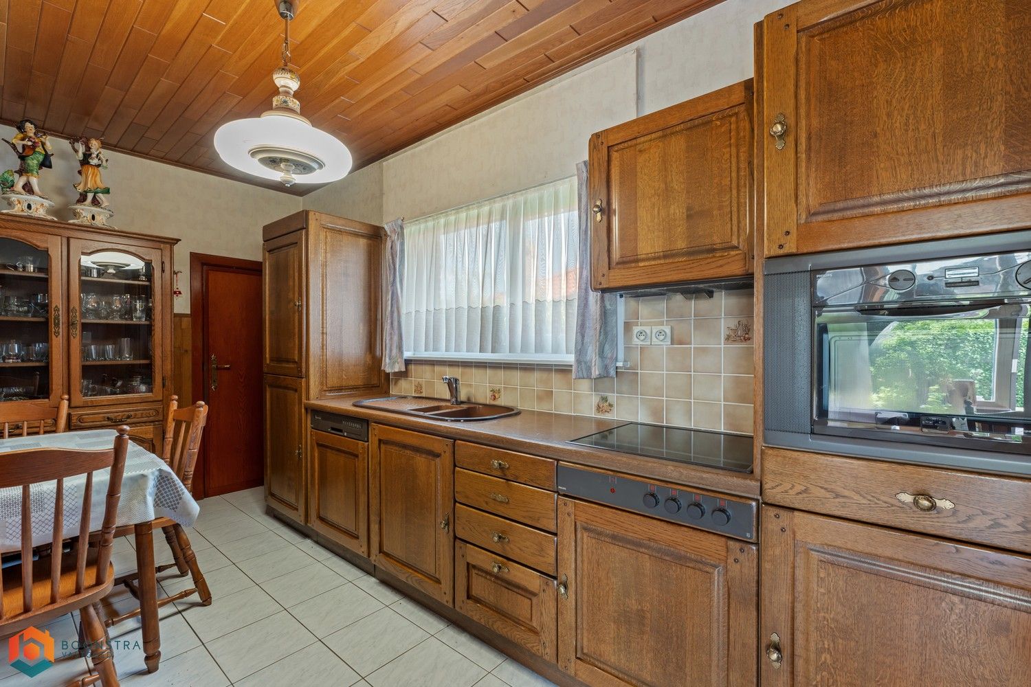 Te renoveren woning met 2 slpkrs foto 8