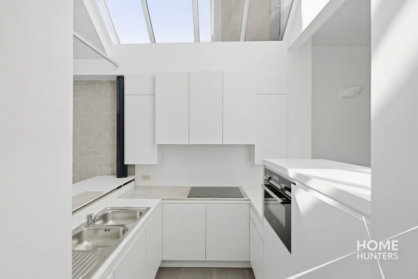 Ruime instapklare stadswoning met 3 slpks, tuin en EPC B foto 9