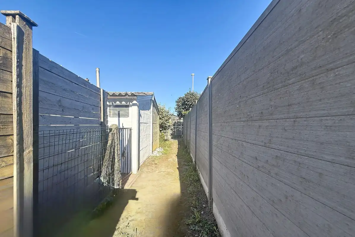 Rijwoning met 3 slaapkamers en uitweg foto 19