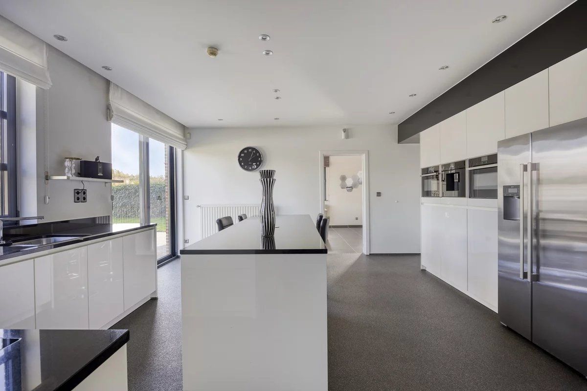 UNIEKE EN ZEER RUIME WONING VAN 311 M² MET 3 SLPK’S EN KANTOOR/KAPSALON IN HASSELT-KORTESSEM foto 11
