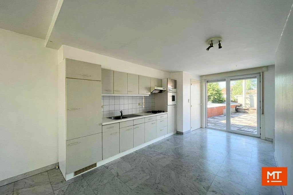 Veelzijdig gebouw bestaande uit handelsruimte, woning en appartement in het centrum van Wervik foto 20
