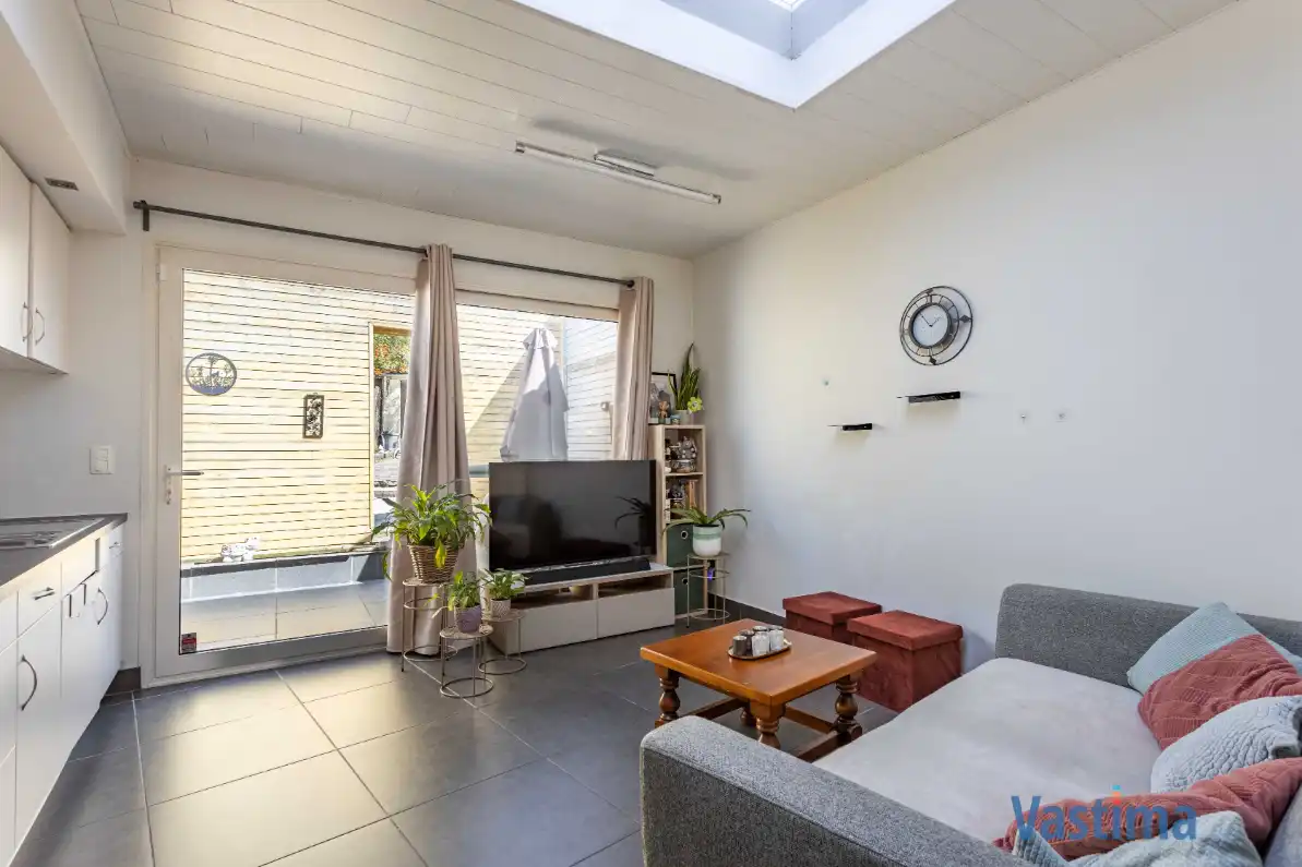 Energiezuinige en instapklare starterswoning met 2 slaapkamers in hartje Erembodegem foto 6