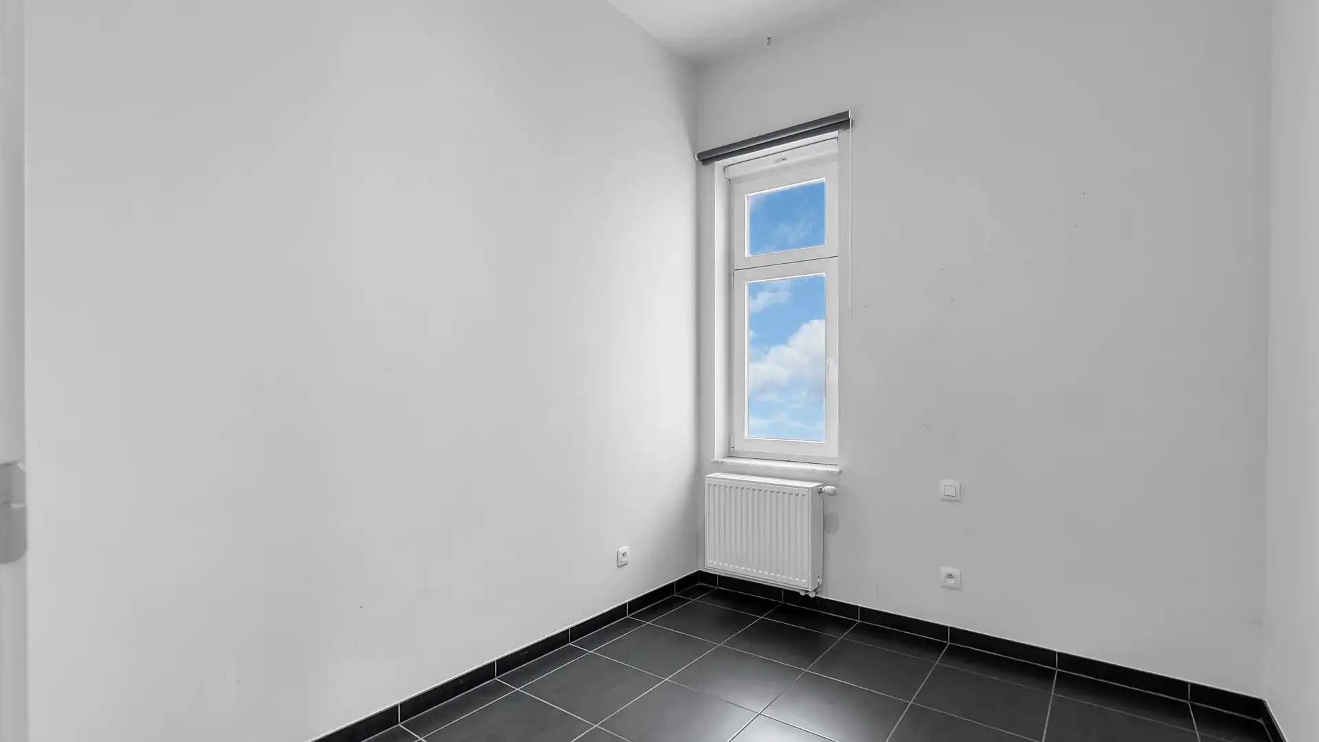 Gelijkvloers appartement met terras en private parking. Uitstekende ligging aan de vernieuwde Markt. foto 18