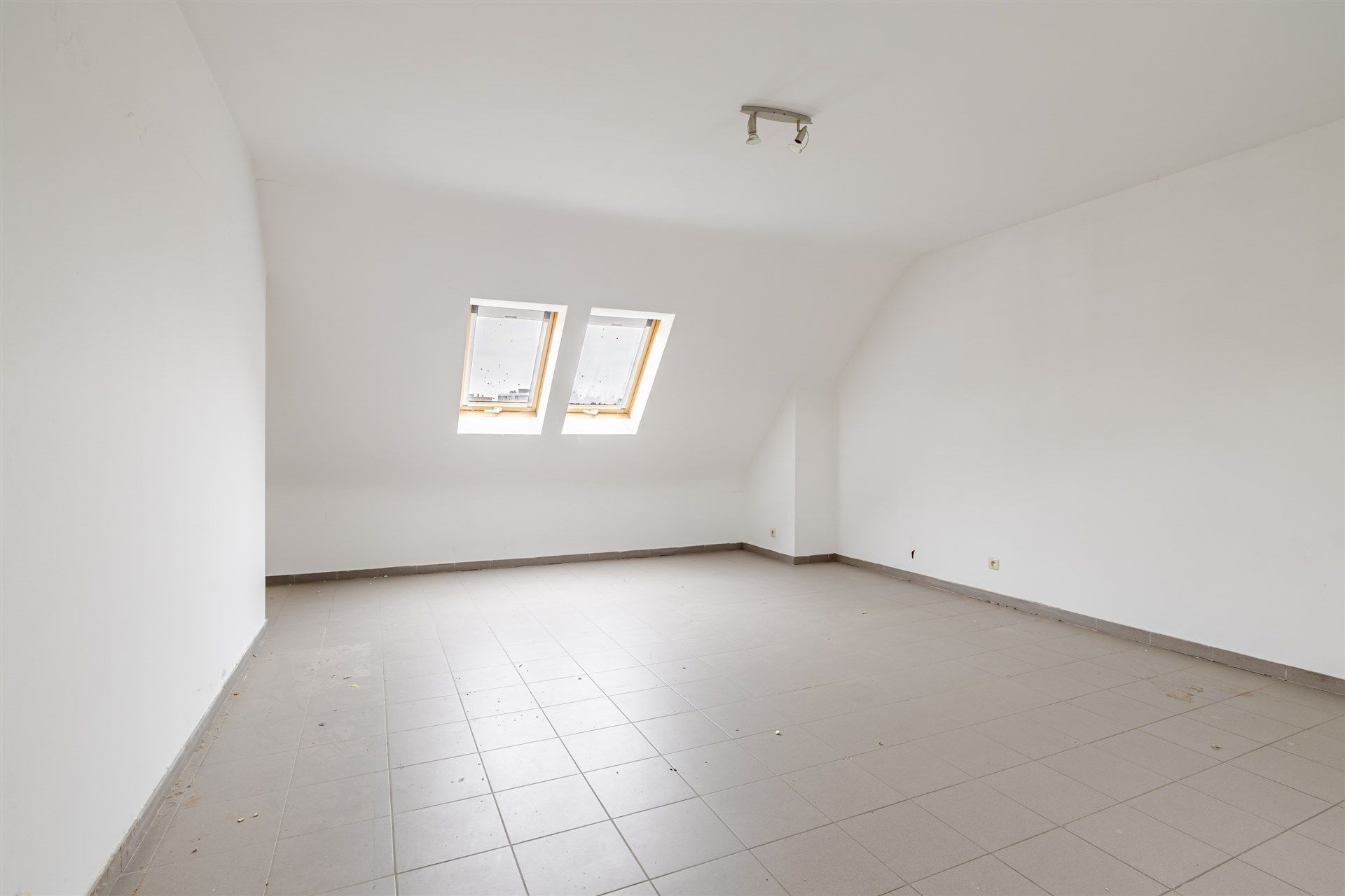 Opbrengsteigendom bestaande uit 6 ruime appartementen + 7 ondergrondse autostaanplaatsen foto 27