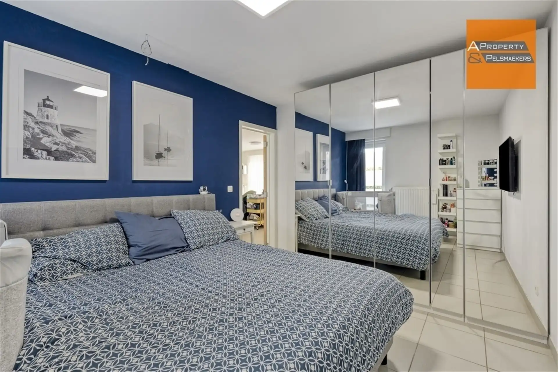 BOD AANVAARD Gelijkvloers appartement met 2 slaapkamers 2 staanplaatsen en tuin foto 12