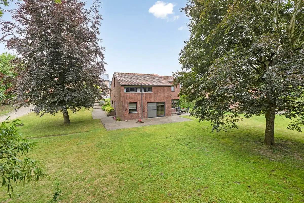 Ruime open bebouwing met zalige tuin in Tongeren-Borgloon foto 29