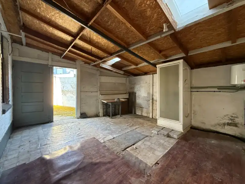 Te renoveren woning met oprit en garage in rustig straatje foto 9