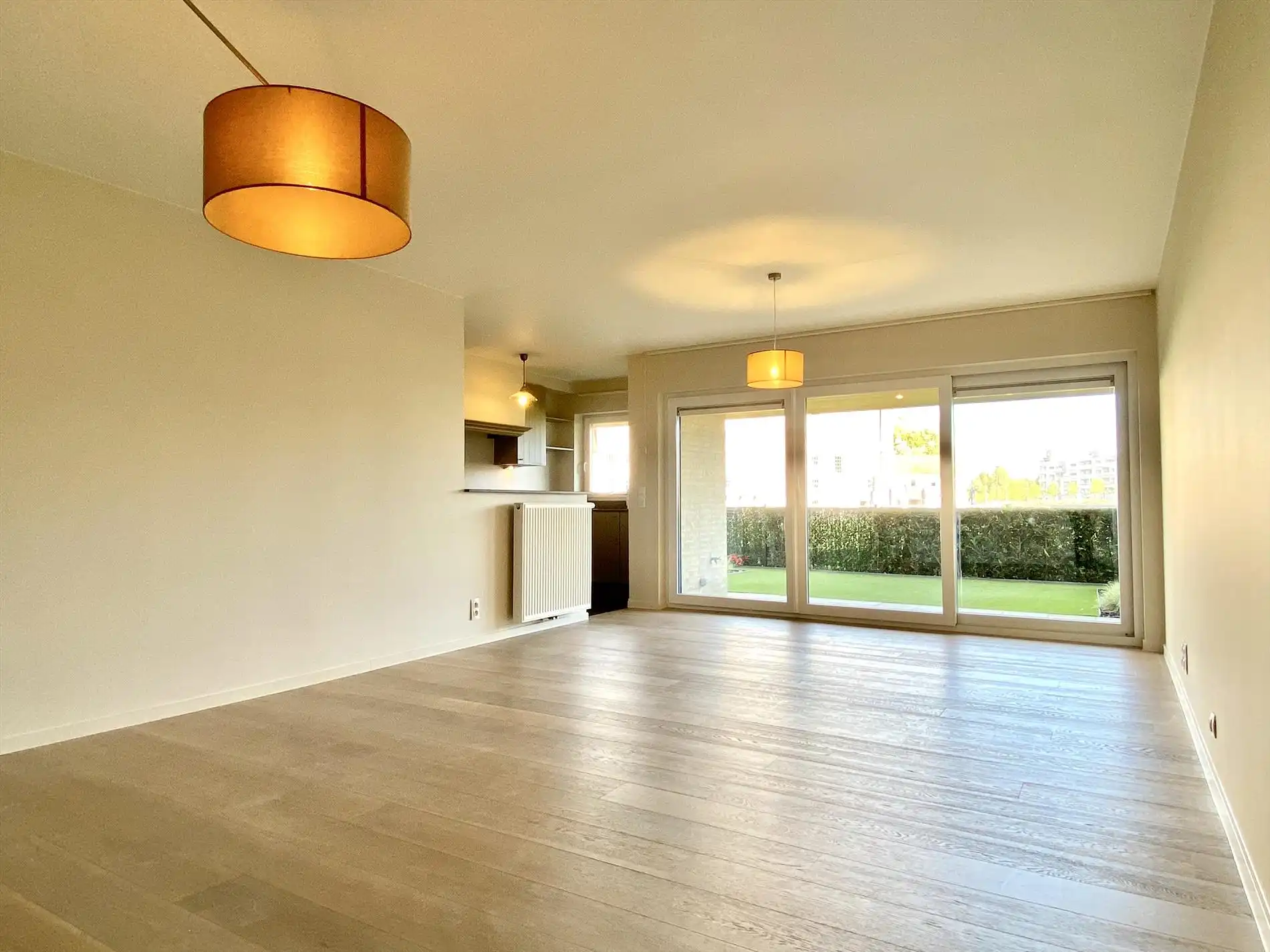 Ontdek dit prachtig gelijkvloers appartement met tuin en zicht op de Leie te Harelbeke! foto 2