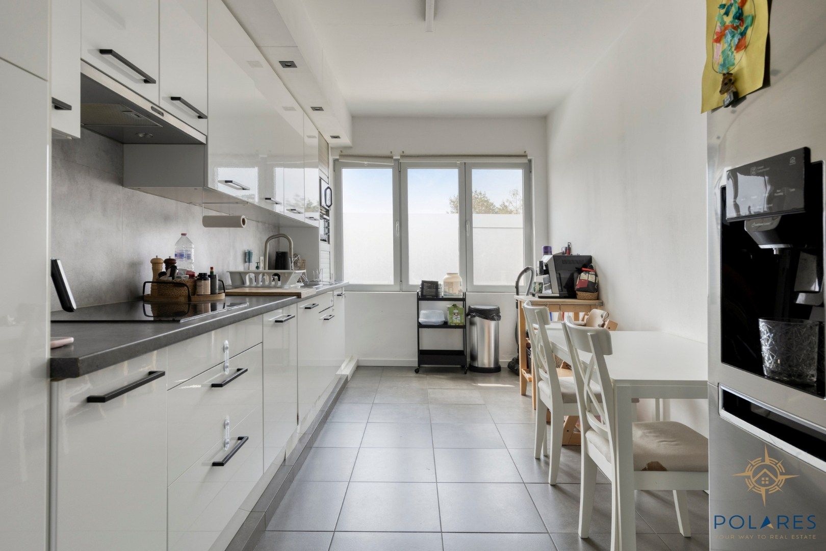 Goed onderhouden opbrengsteigendom met 2 appartementen en garage. foto 7