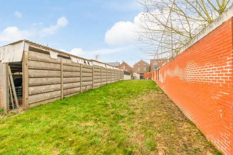 Handelsruimte met woonappartement in het centrum van Wommersom foto 34