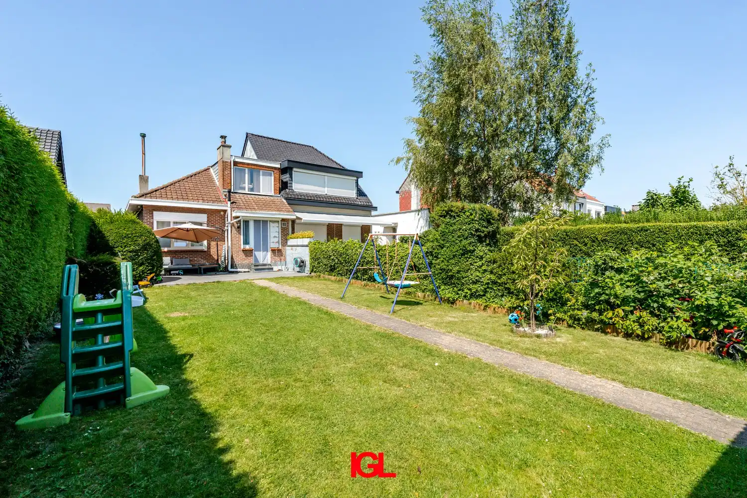 3-gevel woning met zuidgerichte tuin en garage foto 19