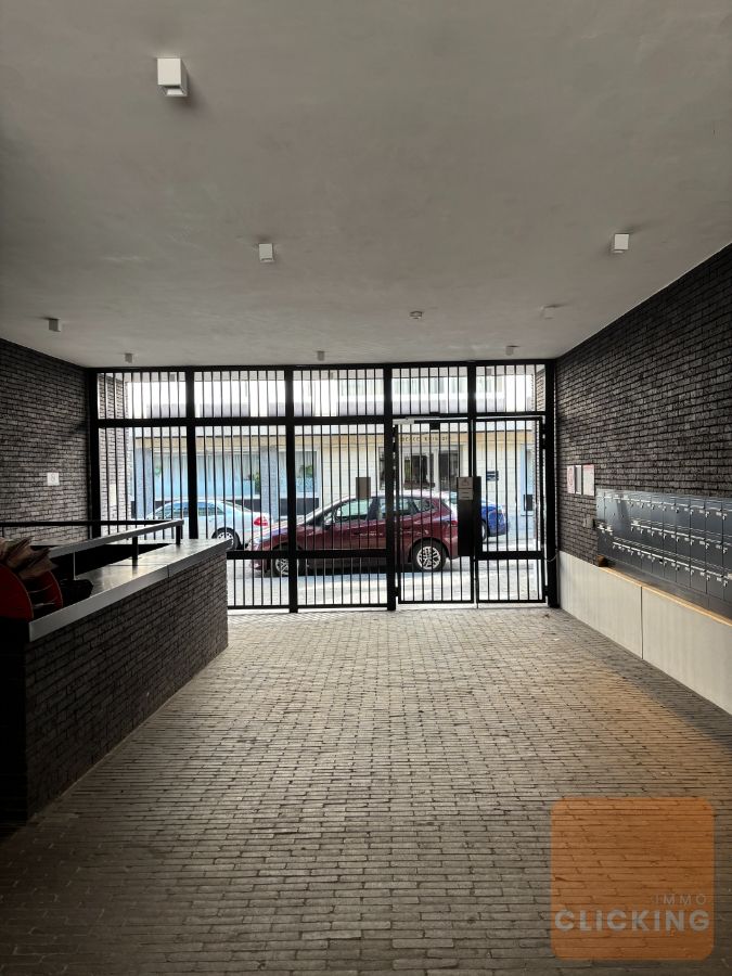 Tof 1 slaapkamerappartement met terras en tuintje foto 16