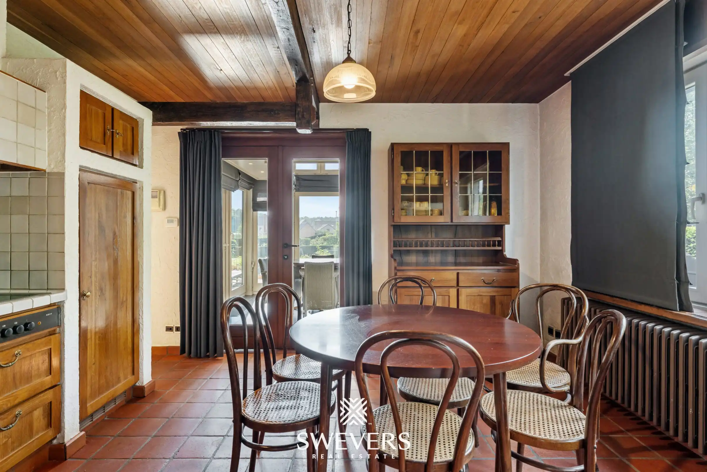 Knappe woning met orangerie, mogelijkheid tot 4 slpk en achterliggende bouwgrond foto 7