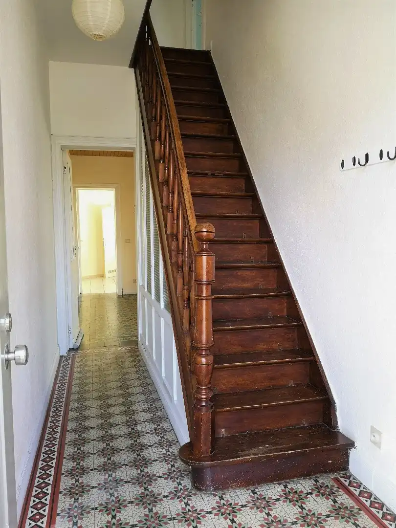 Woning nabij het centrum met 3 slaapkamers & uitweg. foto 2