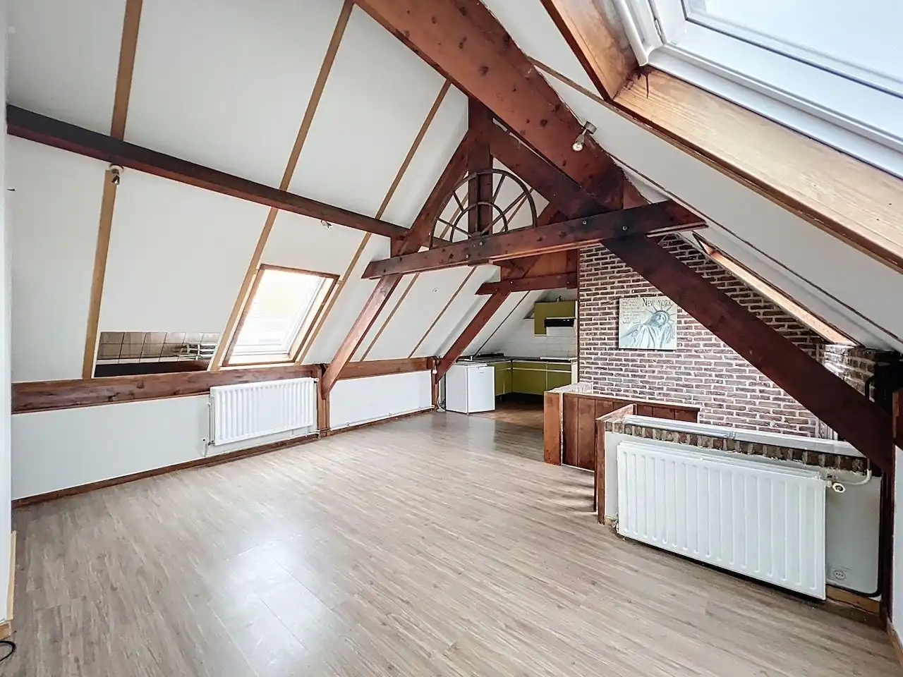 Buitengewoon ruim appartement met open zicht, parking inhuis en multifunctionele zolderruimte foto 16