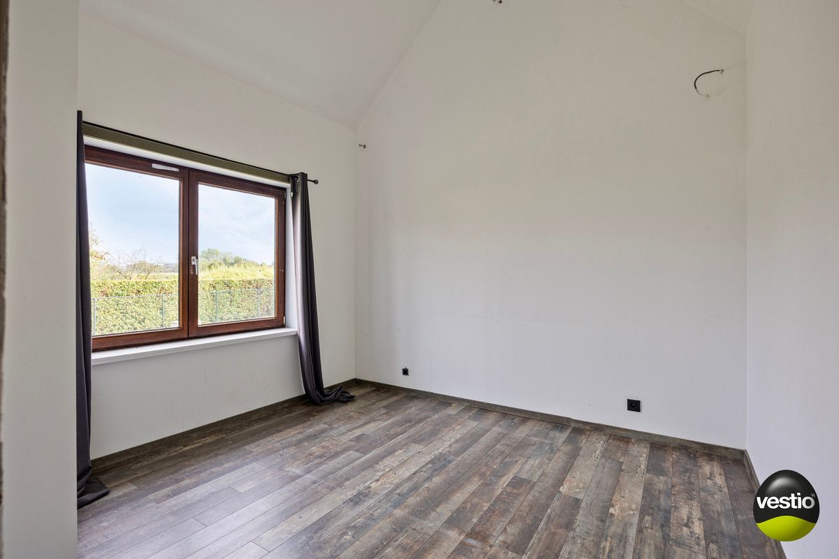 RUSTIG GELEGEN SPLIT LEVEL WONING OP 21A10CA TE KORTESSEM. foto 24