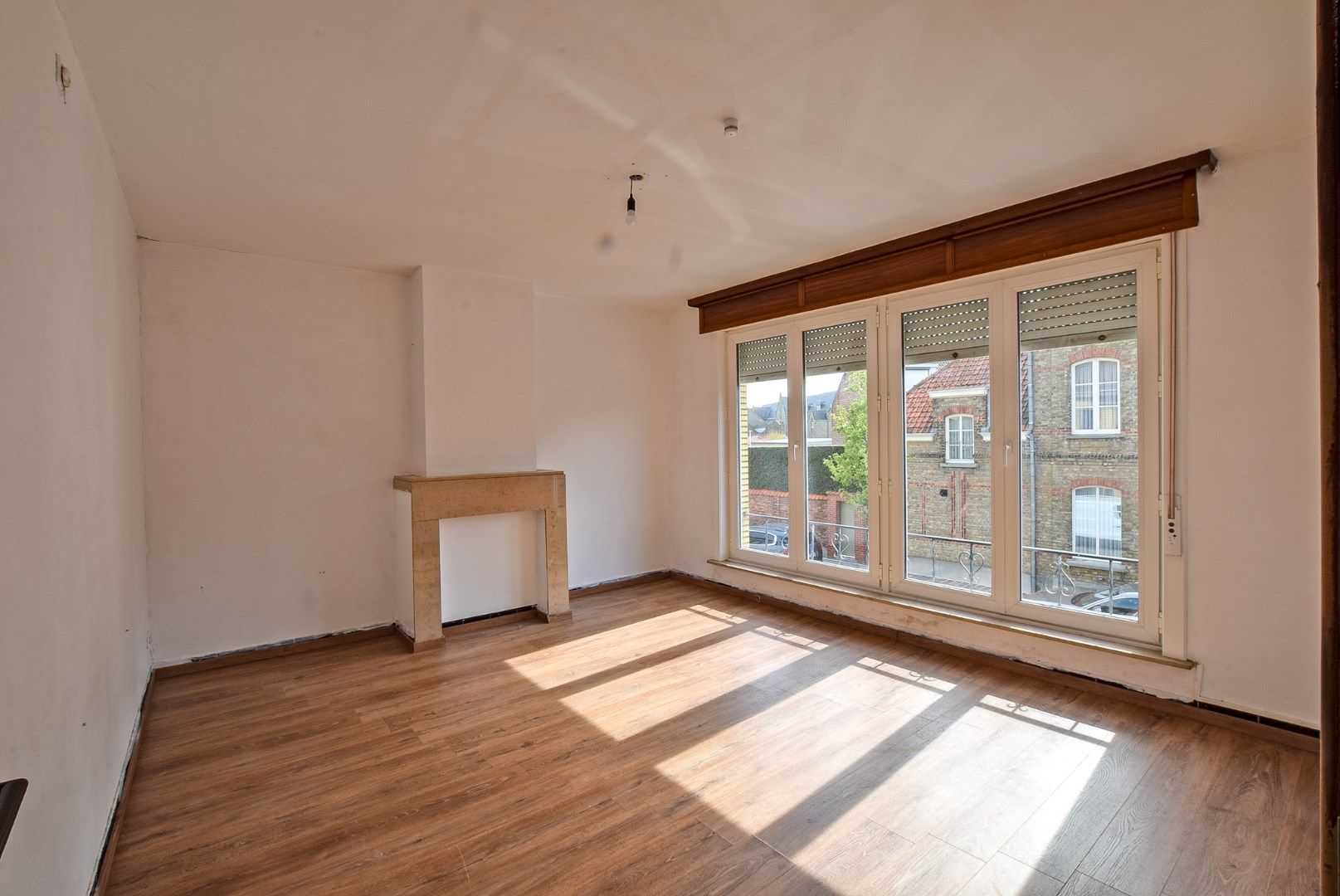 Ruime woning momenteel opgedeeld in 2 appartementen met inpandige garage en tuin op 240m². foto 21