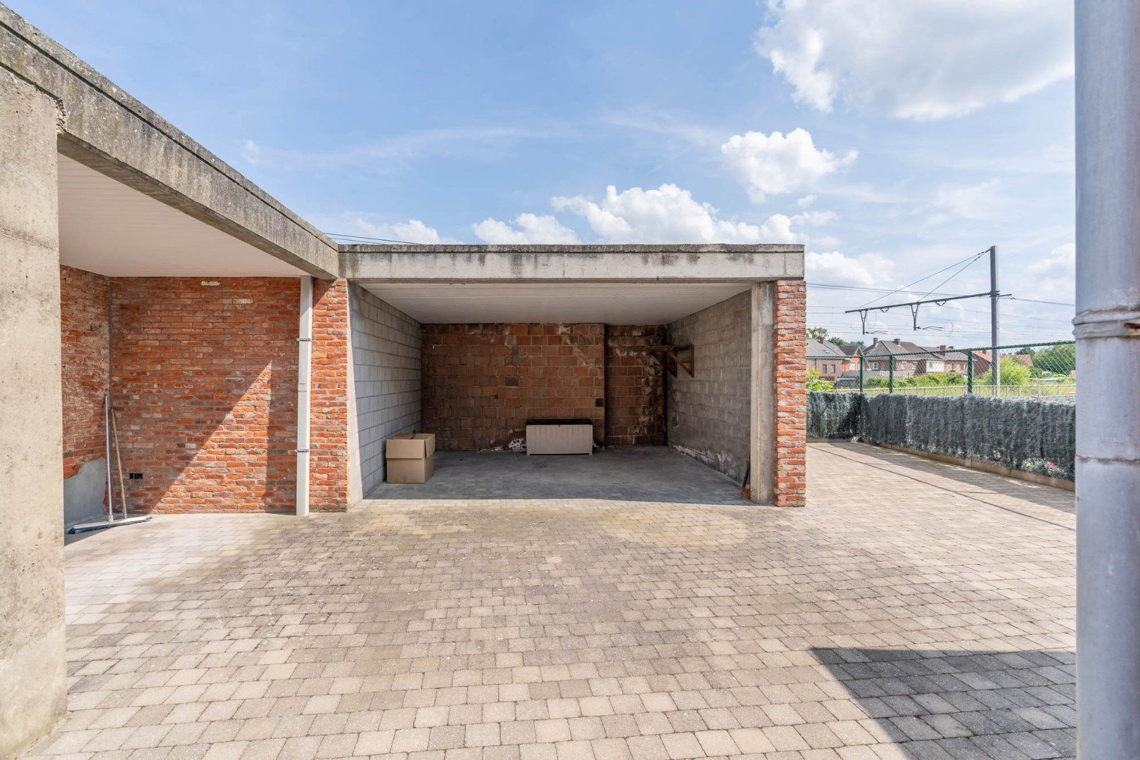 Tweewoonst bestaande uit twee appartementen met 3 carports vlakbij het centrum van Bilzen foto 30