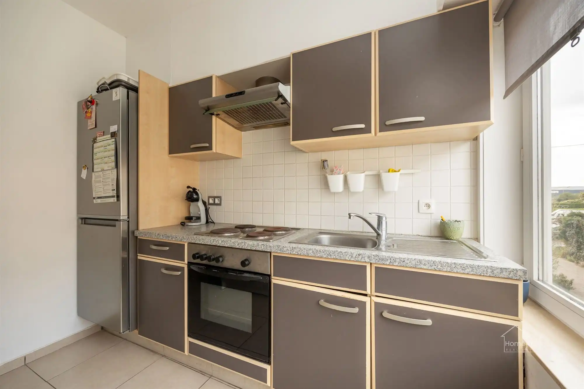 Energiezuinig instapklaar appartement met zéér lage gem. kosten foto 9