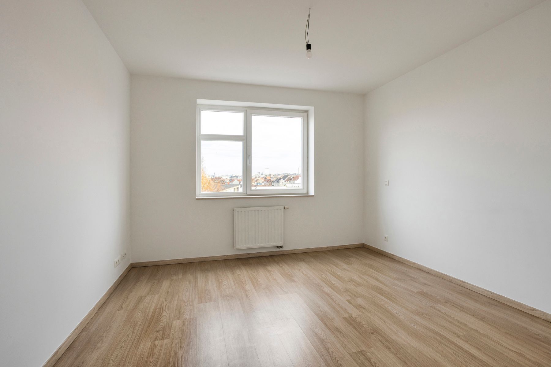 Leemans Immobiliën biedt u dit energiezuinige appartement aan met een adembenemend uitzicht over Brussel. foto 11