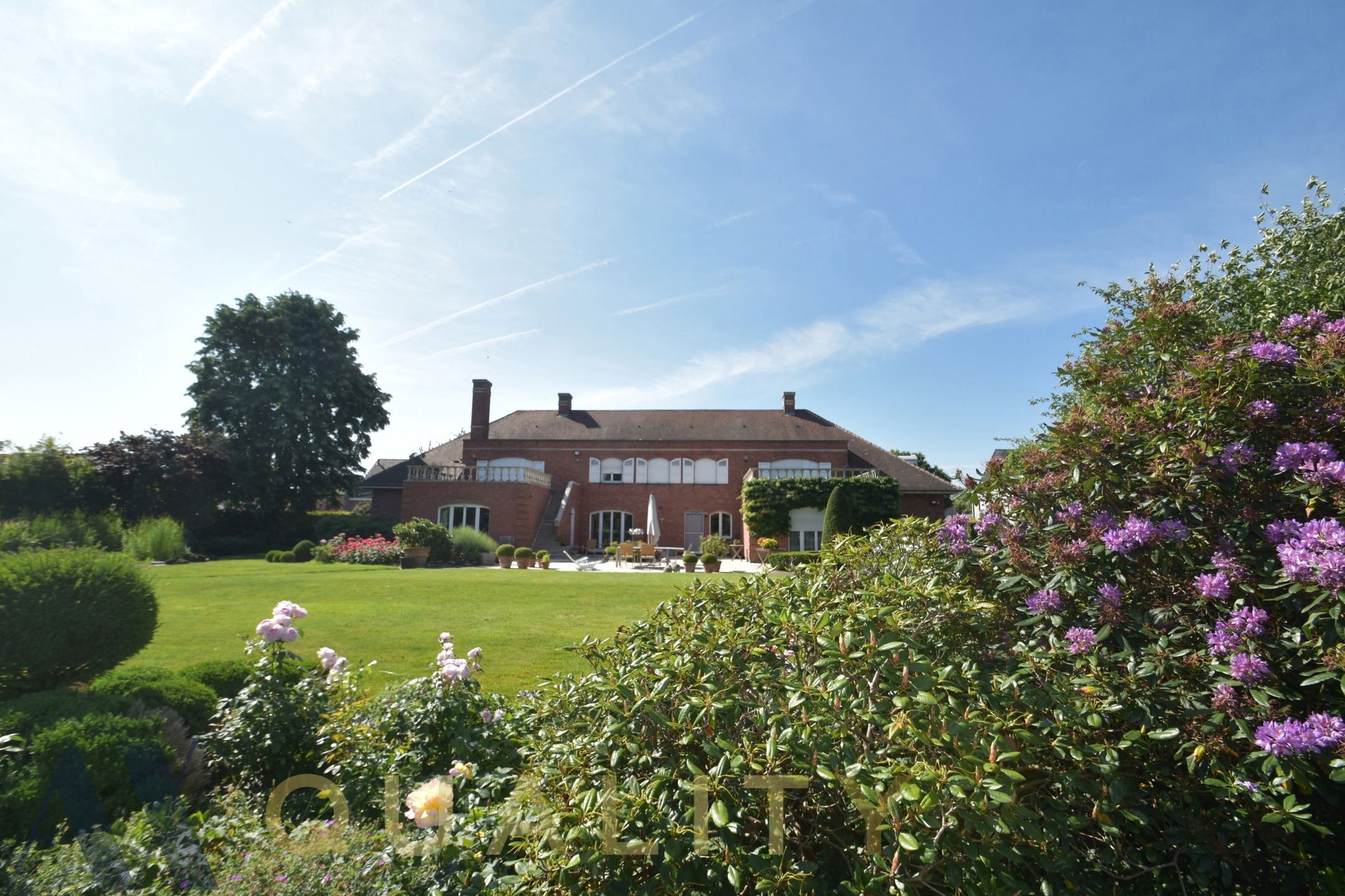 Tijdloze ruime villa met 5 slpk., dub. gar., tuin, tennisveld, polyvalente ruimte en vijver. foto 41