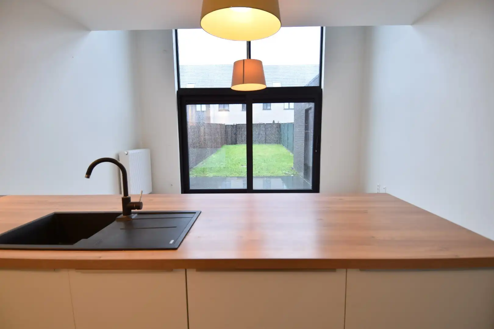 Rijwoning met 3 slaapkamers en tuin in Kortrijk foto 4