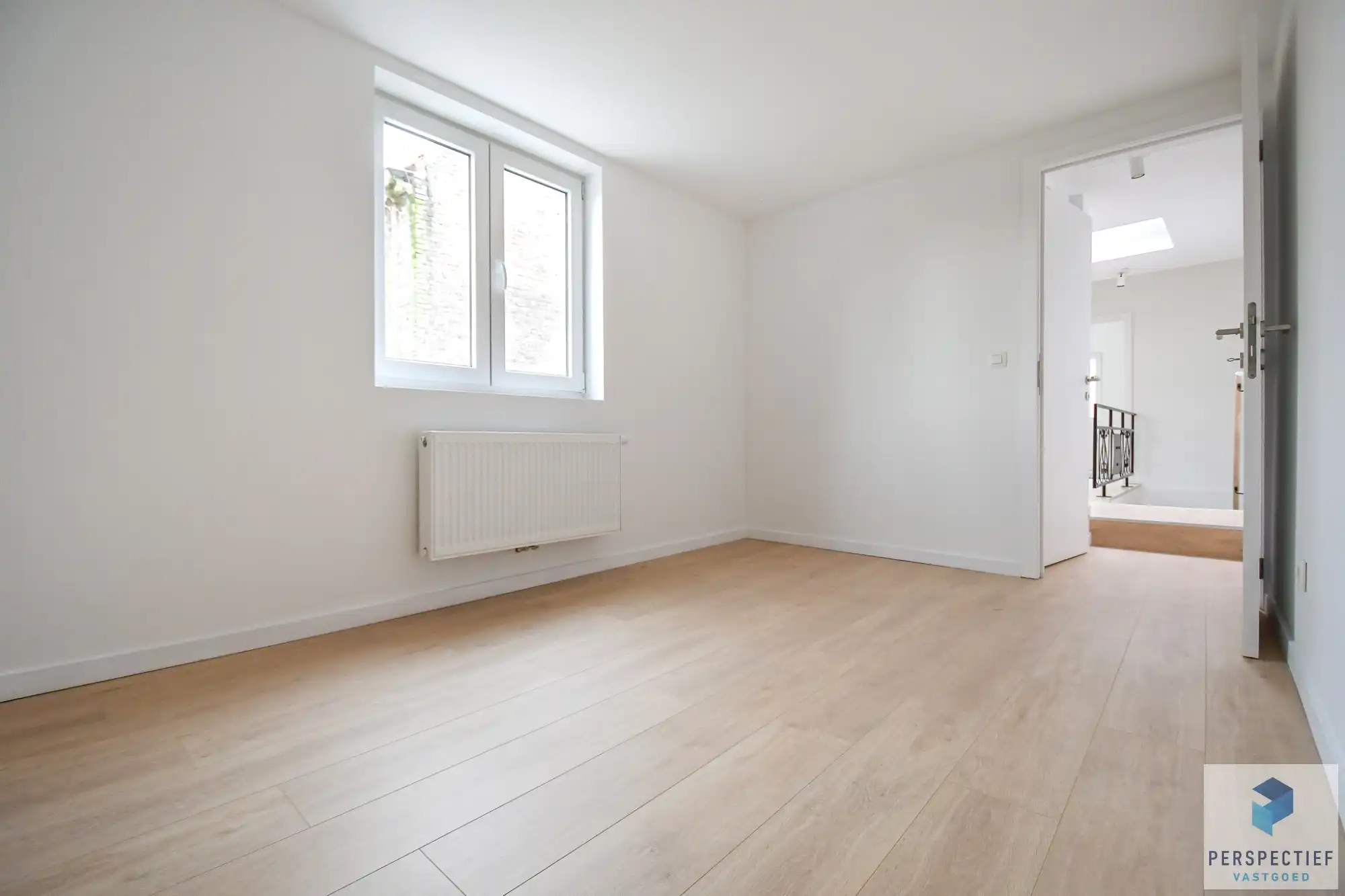 BEZOEKMOMENT ZATERDAG 31/01 VAN 15U TOT 16U30 | GERENOVEERDE woning met 3 slaapkamers en ZONGERICHTE tuin met uitweg en GARAGE foto 17