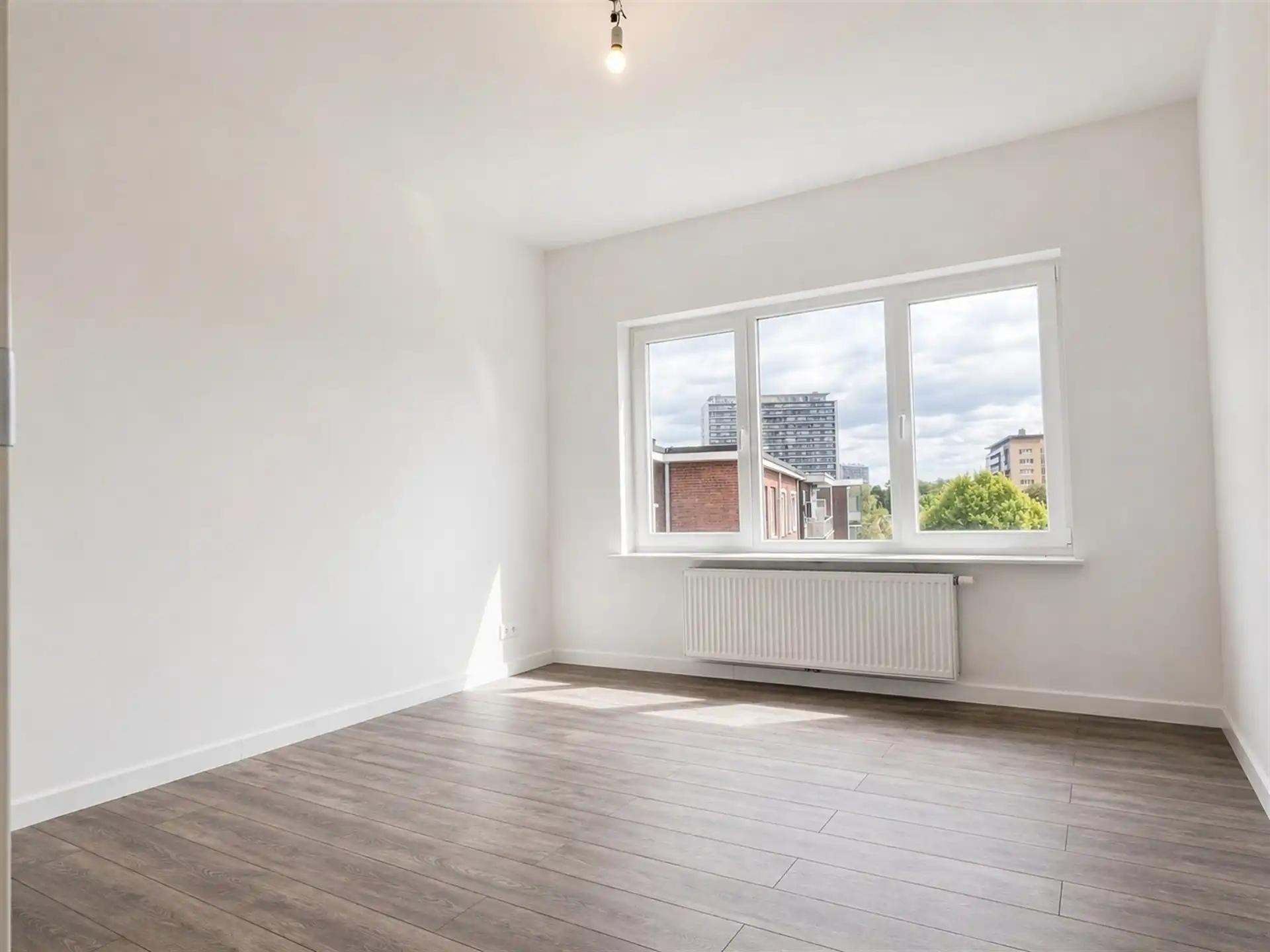 ruim appt met veel lichtinval in hartje Wilrijk! foto 8