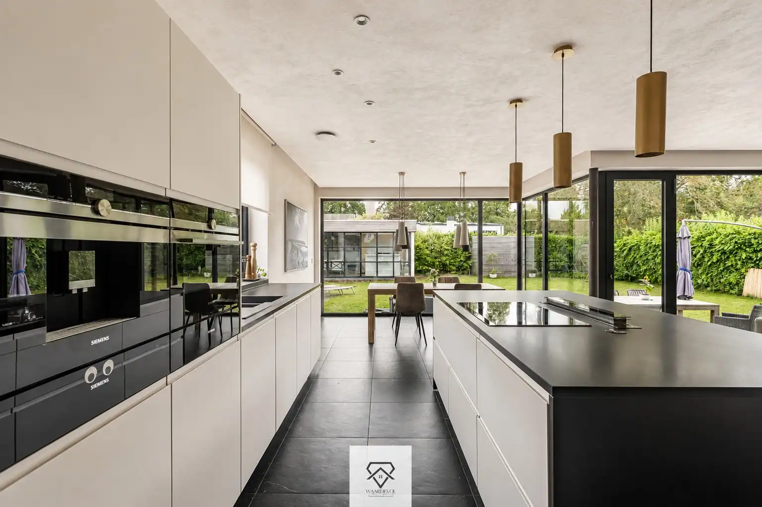 Moderne bungalow met EPC A en ruime kelder in Mariakerke foto 7