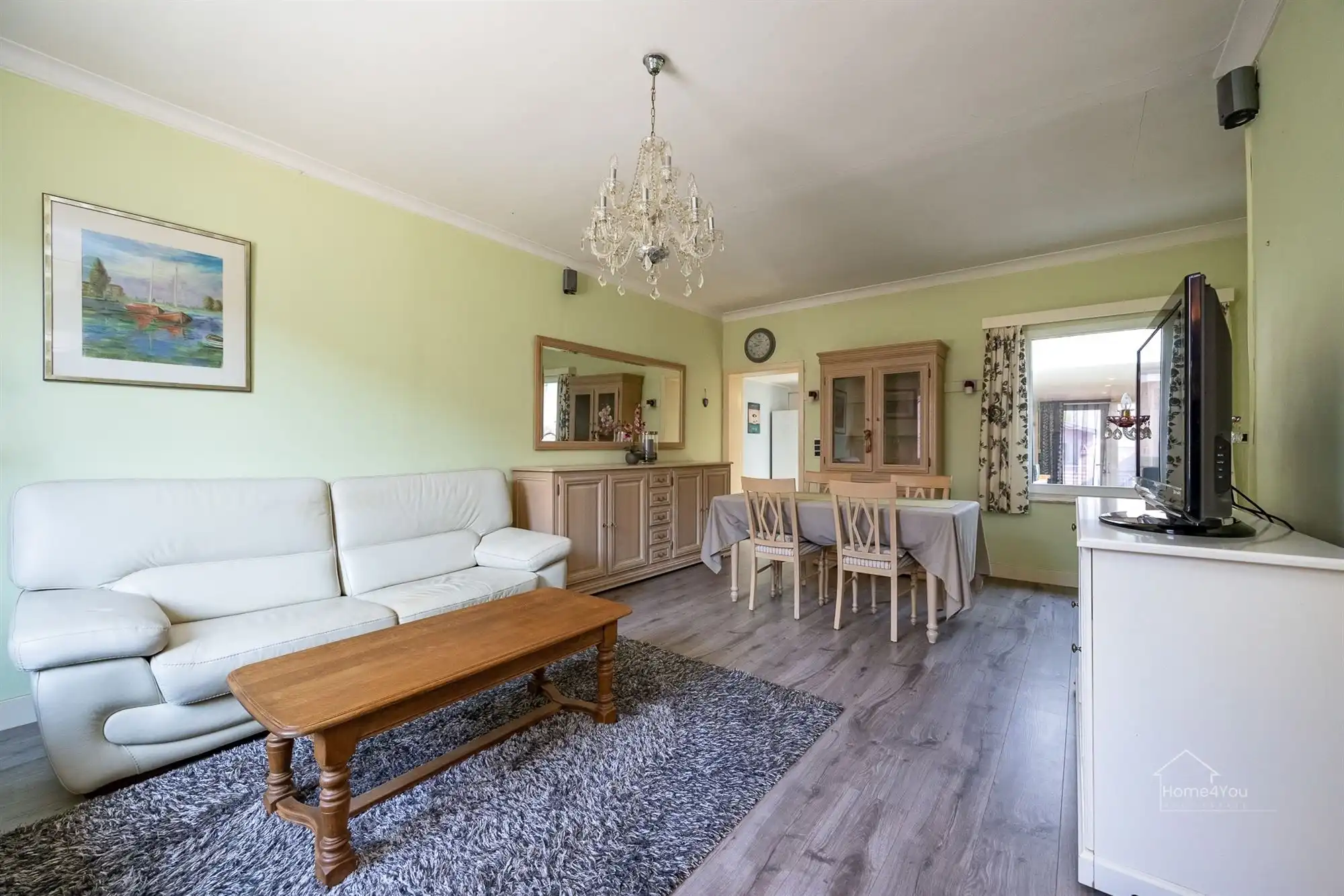 Te renoveren rijwoning met tuintje foto 3