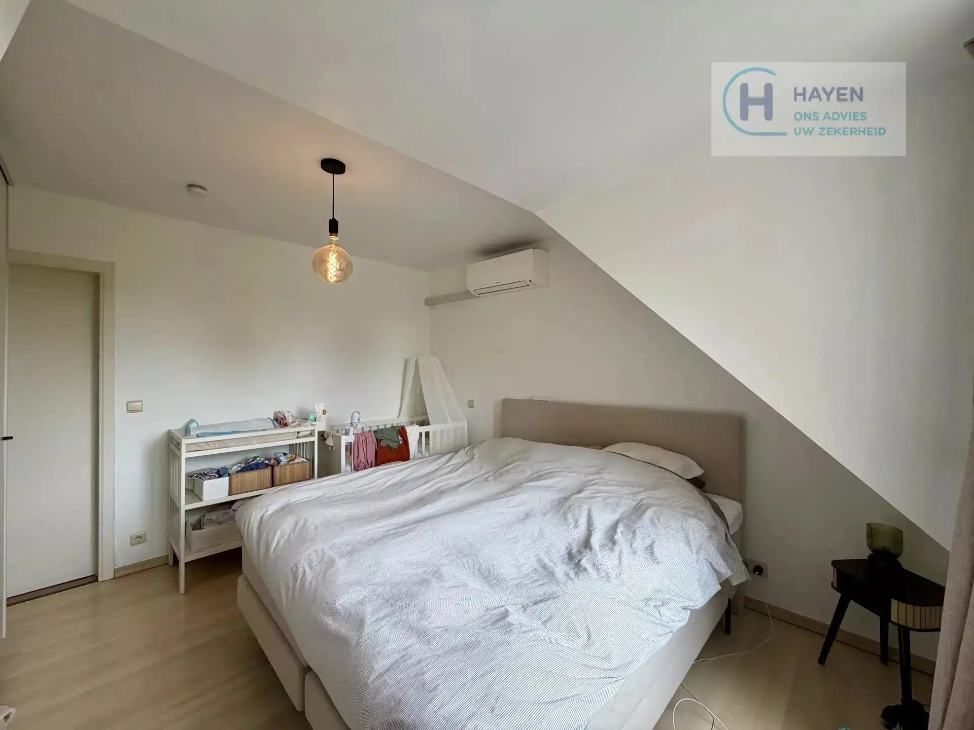 Instapklaar appartement met 2 slaapkamers en bovengrondse garage in hartje Kermt foto 9