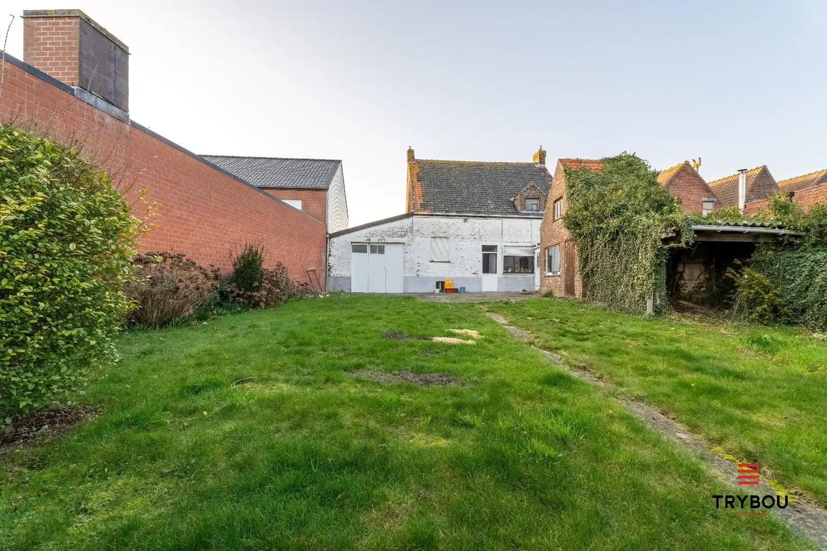 Te renoveren woning met garage en diepe tuin foto 18