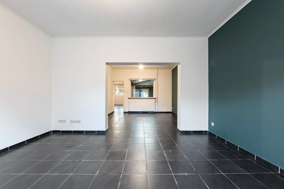 RUIME, INSTAPKLARE WONING MET 4 SLAAPKAMERS EN EEN ZONNIGE TUIN TE HEERS foto 4