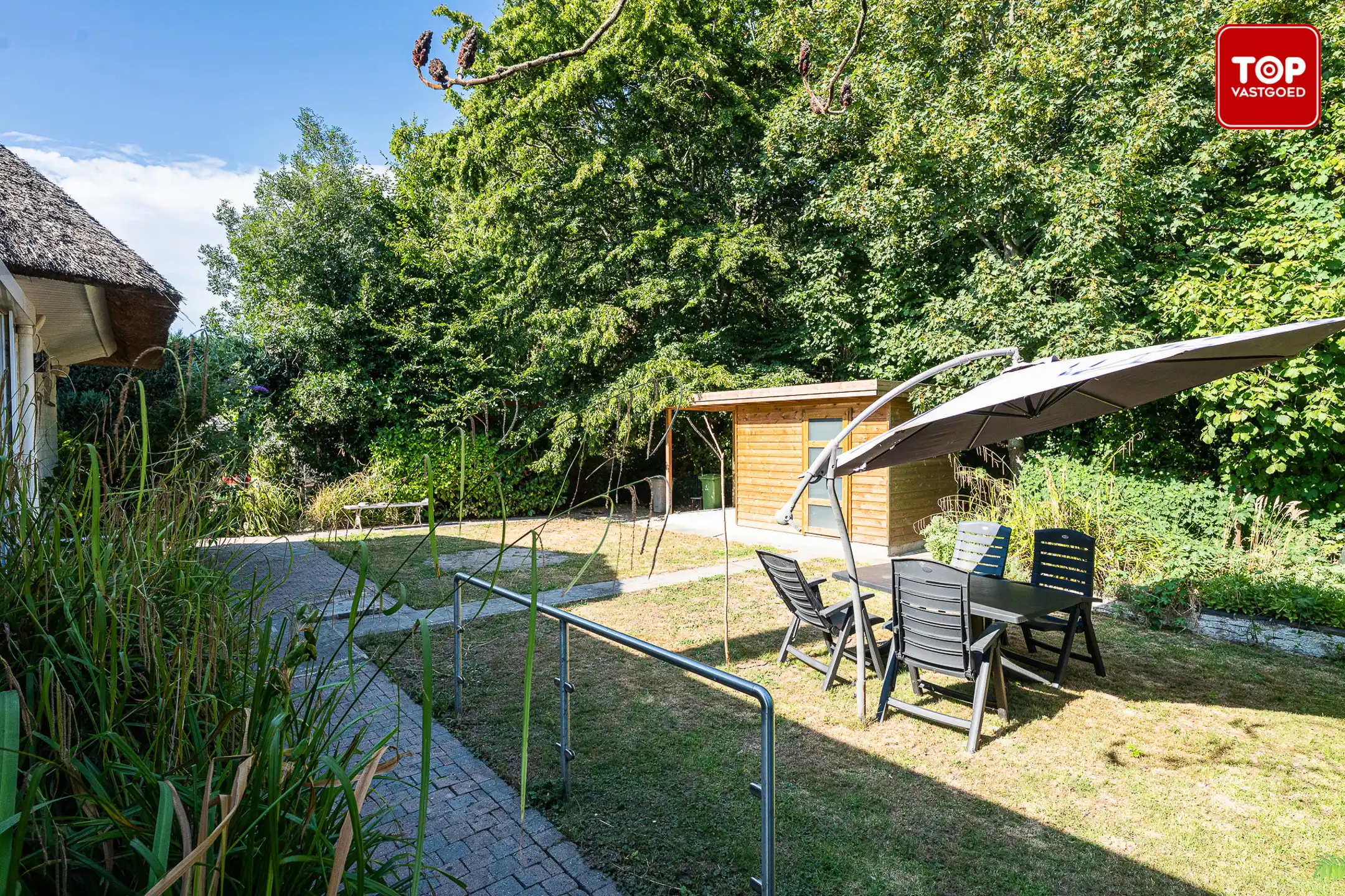Charmante te renoveren woning met karakter en strooien dak foto 19