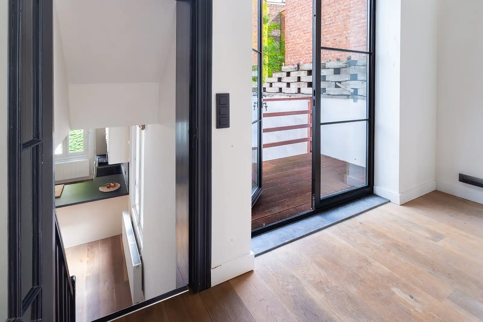 Duplex met terras in bruisende buurt foto 13