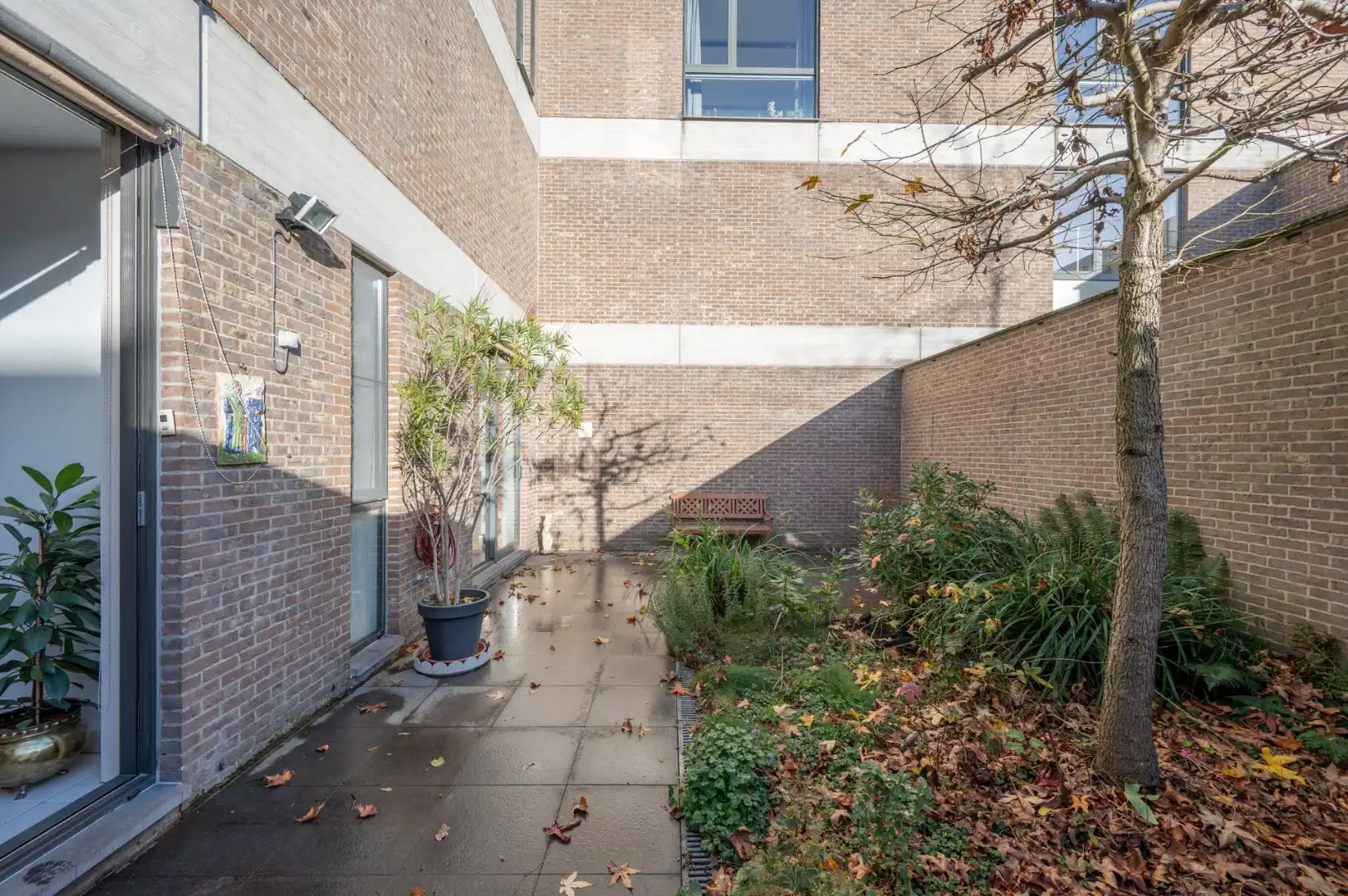 Gelijkvloers hoekappartement op unieke ligging in hartje Brugge foto 13