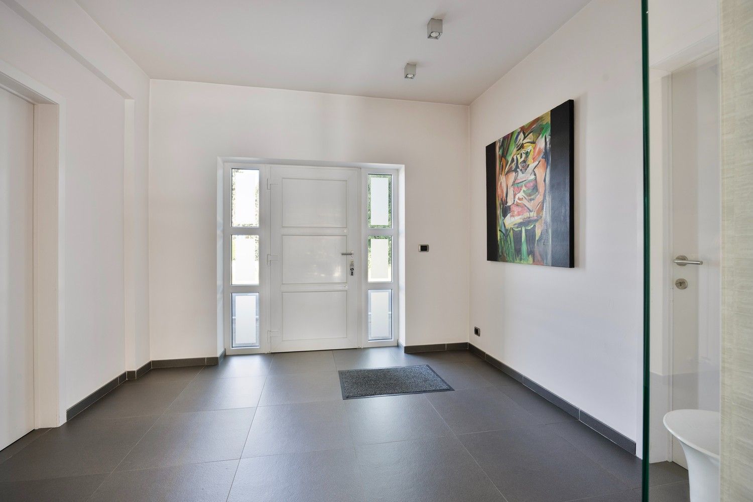 Stijlvol wonen in As: ruime, instapklare woning met tuin en garage foto 3